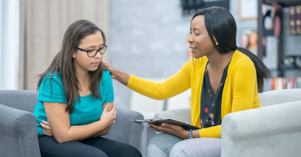 Counselling sevices - counsellor helping a patient